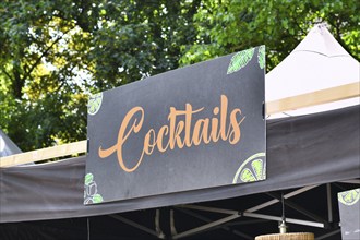 Neckargemund, Germany, May 2023: Sign saying 'Cocktails' on street food truck, Europe