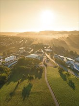 Aerial view small town with fog at sunrise Black Forest, Gechingen Germany