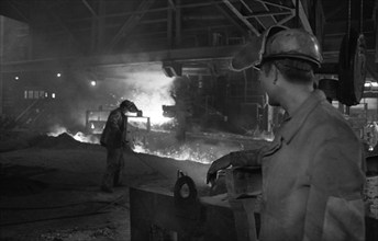 The production of steel at the blast furnace of Hoesch AG Westfalenhuette in 1970, Germany, Europe