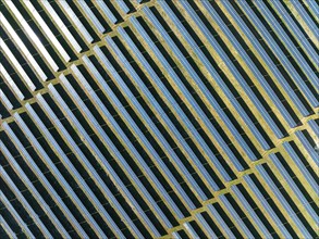 Rows of solar panels at a photovoltaic plant near Espejo, aerial view, drone shot, Córdoba