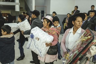 Wedding guests dancing with presents, Huancayo, Peru, South America