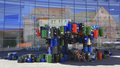 In the historic centre of Nuremberg, art with barrels in front of the Neues Museum Nuremberg, State