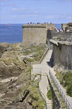 Tourists on rampart at Saint-Malo, Brittany, France, Europe