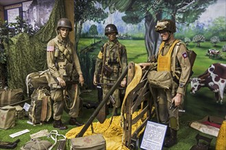 Uniforms and weapons of American airborne soldiers at the Musée Mémorial d'Omaha Beach, WW2 museum