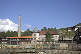 UNESCO Rammelsberg mine with chimney and houses, ore mine, Goslar, Harz, Lower Saxony, Germany,