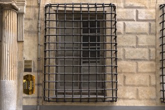 Heavy iron bars on the window of Palazzo Pinelli Parodi in the historic centre, Piazza Pinelli no.