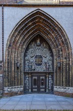 Richly decorated west portal with tetragram in Hebrew, Nikolaikirche Hanseatic City of Stralsund,