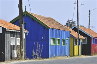 Colourful cabins of oyster farm at la Baudissière near Dolus, Saint-Pierre-d'Oléron on the island