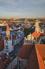 Aerial view of Munich, Marienplatz and Altes Rathaus from St. Peter's church on sunset. Munich,