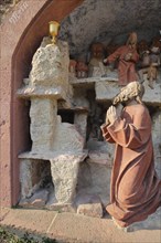 Biblical depiction and scene from the Mount of Olives with Jesus praying with chalice at the