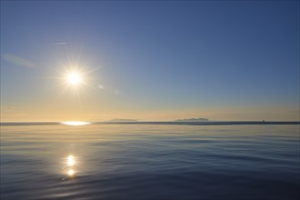 Sun as star, sunrise, morning light, view over the sea, Levanzo, Favignana, Marettimo, Egadi