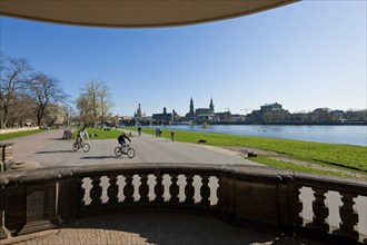 Dresden silhouette in spring. Numerous Japanese cherry trees blossom on the banks of the Neustädter