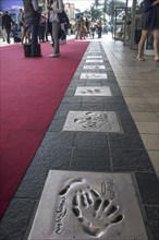 Handprints of movie stars at the Palais des Festivals et des Congrès in the city Cannes, French