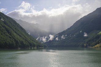 Vernagt reservoir and clouds, Vernagt, South Tyrol, Italy, Europe