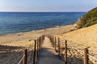 Beach access, boardwalk through dune landscape by the sea, Spiaggia di Scivu, Arbus, Costa Verde,