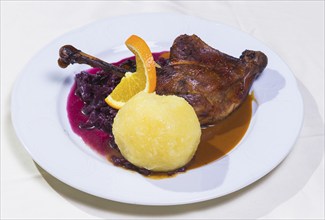 Duck with red cabbage and dumplings