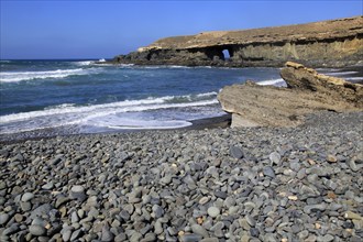 Waves breaking on beach at Playa de Garcey, Fuerteventura, Canary Islands, Spain, Europe