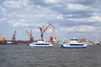 Boats and cranes in the harbour of Gothenburg, Västra Götalands län, Sweden, Europe