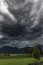 Dark storm clouds during a thunderstorm, storm, summer, mountain landscape, Loisach-Lake