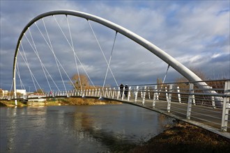 Cantilever pedestrian bridge over the River Mulde near Dessau, arch bridge, modern architecture,