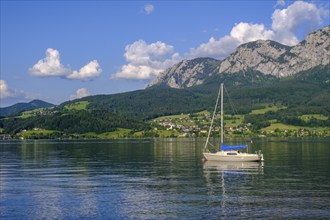 Sailing ship on the western shore, near Buchenort, Attersee with Höllengebirge, Salzkammergut,