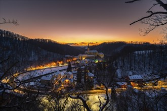 Winter evening in the Müglitz valley, impressively illuminated Weesenstein Castle at the blue hour,