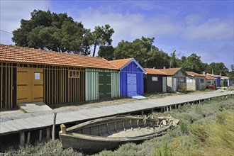 Colourful cabins of oyster farm at la Baudissière near Dolus, Saint-Pierre-d'Oléron on the island