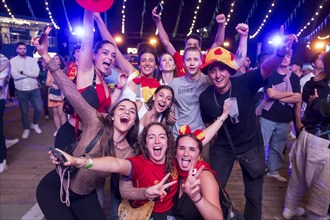 Group of fans at the Adidas fan zone at the Bundestag after the final match between Spain and