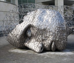 Head sculpture by artist Rick Kirby in Calne town centre, north Wiltshire, England installed in