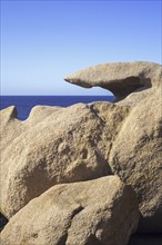 Strange rock formations and water, wind eroded boulders along the Côte de granit rose, Pink Granite