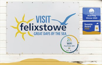 Visit Felixstowe tourism campaign poster on beach hut, Felixstowe, Suffolk, England, UK Great Days