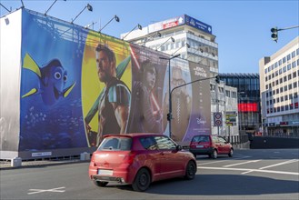 Advertising, large poster, for the new streaming service Disney Plus, in Düsseldorf