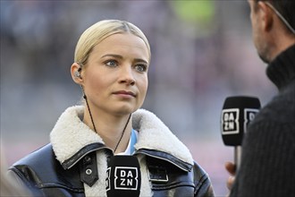 DAZN presenter Lena Cassel, portrait, interview with TV expert Fredi Bobic, microphone, logo,