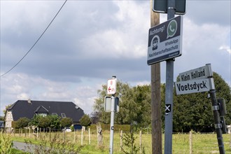 Neighbourhood protection sign against burglars, via WhatsApp groups, rural area near the village of