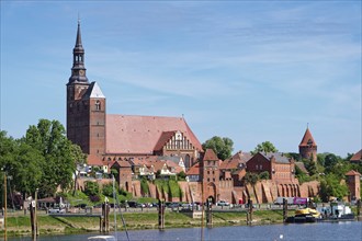 The river Tangier at the harbour of Tangermünde in front of the city wall and the old town and the