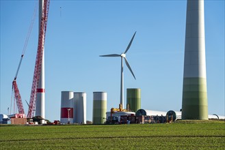 Construction site of a new wind turbine, modules of the tower, wind turbine from the manufacturer