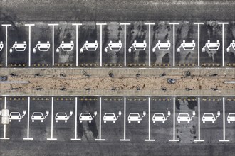 Aerial view of charging stations for electric cars at the Tesla Gigafactory in Grünheide, 28 01