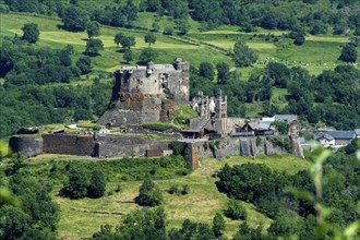 View of the medieval castle of Murol in the Auvergne Volcanoes Regional Natural Park, Puy de Dome,