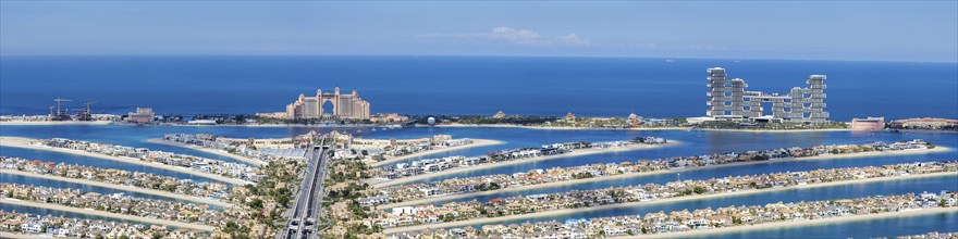 The Palm Jumeirah with Atlantis Hotels panorama artificial island from above in Dubai, United Arab