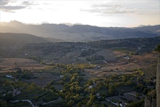 View over countryside and mountains at dusk from Ronda, Spain, Europe