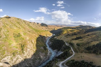 Mountain landscape with river in a narrow mountain valley in autumn, Little Naryn or Kichi-Naryn,