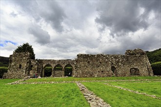 Abbey church, ruins of Cymer Abbey in a meadow, former Cistercian abbey, Dolgellau, Gwynedd, Wales,