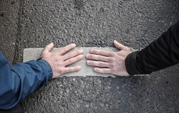 Activists of the Last Generation have taped their hands on a street, Berlin, 24 04 2023