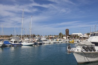 Marina with lighthouse, Caleta de Fuste, Fuerteventura, Canary Islands, Spain, Europe