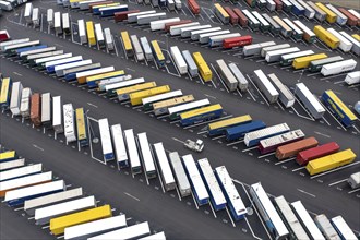 Containers and swap trailers are parked in a car park at the Tesla Gigafactory, Grünheide, 28.01