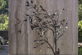 Wrought-iron tree with leaves on a grave, Staglieno Monumental Cemetery, Cimitero Monumentale di