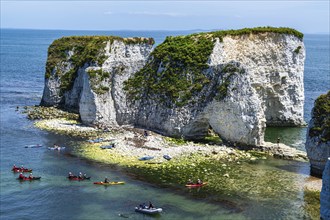 People on kayaks and paddleboards, White Cliffs. Old Harry Rocks Jurassic Coast, Dorset Coast,