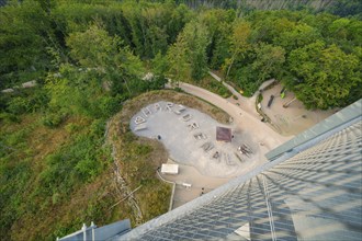 Viewpoint on a forest clearing with the lettering 'Harzdrenalin' on a sandy place,