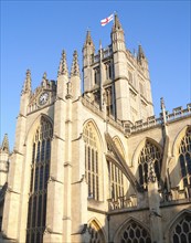 English flag flying on the tower of the Abbey church, Bath, Somerset, England, United Kingdom,