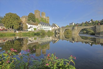 Old Lahn bridge built 1448 with castle built 12th century, Lahn valley, reflection, historic stone